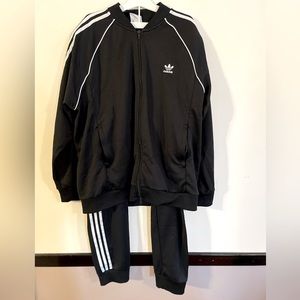 Adidas Track Suit featuring double zipper on jacket